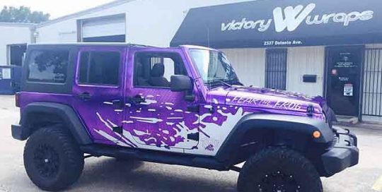 Jeep Wrangler wrapped in custom purple printed on 3M IJ8150 Clear over Avery Silver Chrome vinyl with Avery SW Brushed Aluminum overlays