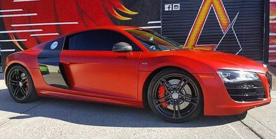 Audi R8 wrapped in Satin Smoldering Red vinyl
