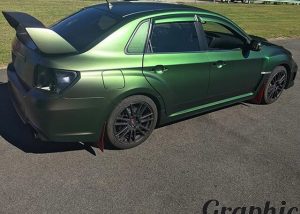Subaru WRX wrapped in Avery ColorFlow Satin Urban Jungle Silver/Green vinyl