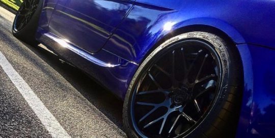 BMW M6 wrapped in Gloss Blue Raspberry vinyl