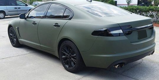 Jaguar XF wrapped in Matte Military Green vinyl