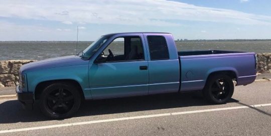 GMC Sierra wrapped in Orafol Shift Effect Matte Turquoise/ Lavender shade shifting vinyl