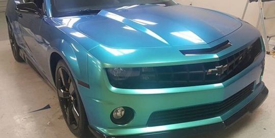 Chevrolet Camaro wrapped in Orafol Shift Effect Gloss Aquamarine shade shifting vinyl
