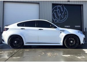BMW X6M wrapped in Gloss White vinyl