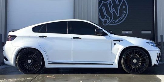 BMW X6M wrapped in Gloss White vinyl