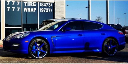 Porsche Panamera wrapped in Gloss Blue Raspberry vinyl