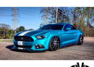 Mustang GT wrapped in Gloss Atomic Teal vinyl
