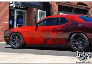 Dodge Challenger Hellcat wrapped in custom printed 3M 1080 Gloss Dragon Fire Red vinyl