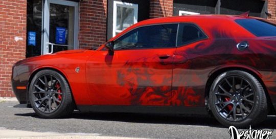 Dodge Challenger Hellcat wrapped in custom printed 3M 1080 Gloss Dragon Fire Red vinyl