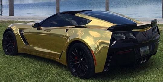 Chevy Corvette wrapped in Avery SW Gold Chrome vinyl