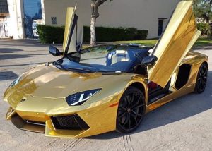 Lamborghini Aventador wrapped in Avery SW Gold Chrome vinyl