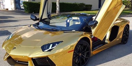 Lamborghini Aventador wrapped in Avery SW Gold Chrome vinyl