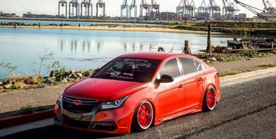 Chevy Cruze wrapped in Avery SW Gloss Diamond Red vinyl