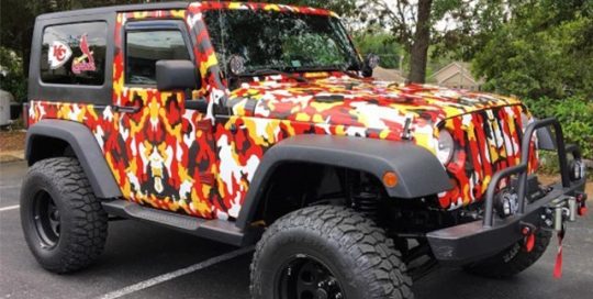 Jeep Wrangler wrapped in custom printed Avery 1005EZRS vinyl