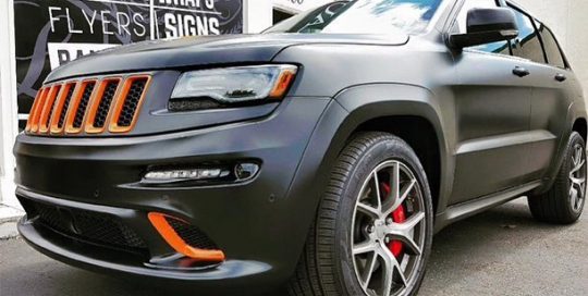 Jeep GrandCherokee SRT8 wrapped in Avery SW Satin Black and 3M 1080 Gloss Burnt Orange vinyls