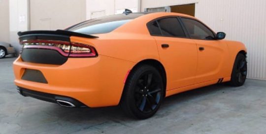 Dodge Charger wrapped in Avery SW Matte Orange vinyl