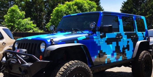 Jeep Wrangler wrapped in custom printed digitalcamo on Avery MPI 1005 vinyl and DOL Sparkle overlam vinyl