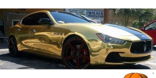 Maserati Ghibli wrapped in Avery SW Gold Chrome vinyl