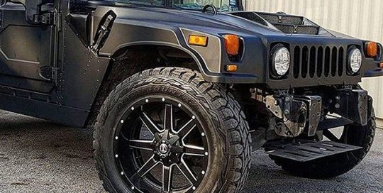 Hummer H1 wrapped in Matte Deep Black vinyl