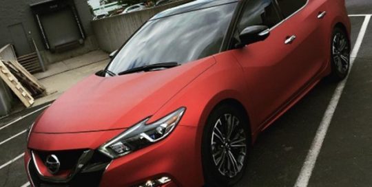 Nissan Maxima wrapped in Arlon UPP Red Aluminum vinyl