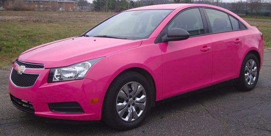 Chevrolet Cruze wrapped in Orafol 970RA Telemagenta vinyl