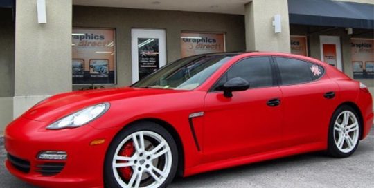 Porsche Panamera wrapped in Avery SW Satin Carmine Red vinyl