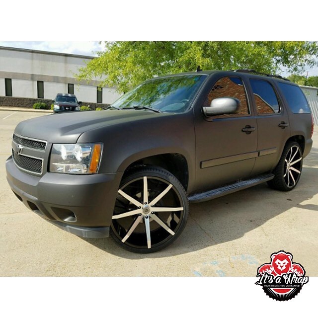Chevy Tahoe wrapped in Avery SW Matte Black vinyl