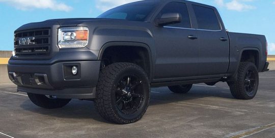 GMC Sierra wrapped in Arlon UPP Gunpowder vinyl
