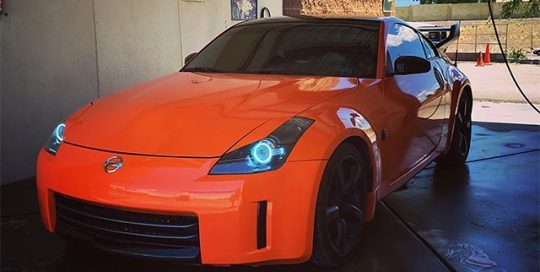 Nissan 370Z wrapped in Avery SW Gloss Orange vinyl