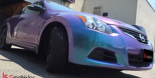 Nissan Altima wrapped in Orafol 970RA Shift Effect Gloss Turquoise/Lavender vinyl