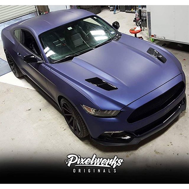 Ford Mustang wrapped in Avery Matte Night Blue Metallic vinyl