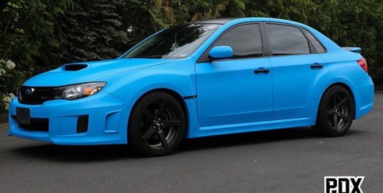 Subaru WRX wrapped in Matte Riviera Blue vinyl