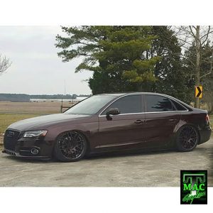 Audi A4 wrapped in Black Rose vinyl