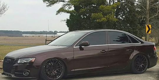 Audi A4 wrapped in Black Rose vinyl