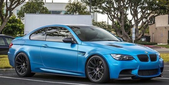 BMW wrapped in Satin Pearl White vinyl