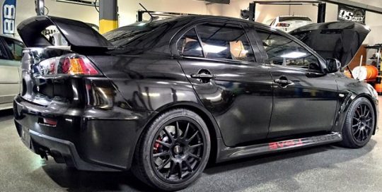 Mitsubishi Evo wrapped in Avery SW Gloss Black Metallic vinyl