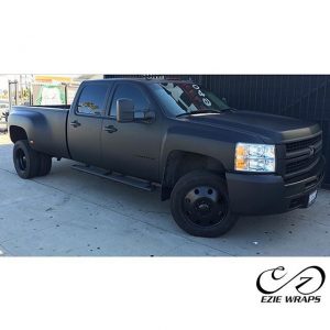Chevy Silverado Dually wrapped in Matte Deep Black vinyl