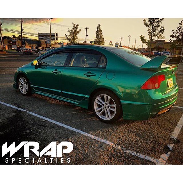 Honda Civic SI wrapped in Avery SW Gloss Dark Green Pearl vinyl