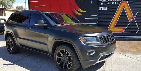 Jeep GrandCherokee wrapped in Satin Black vinyl
