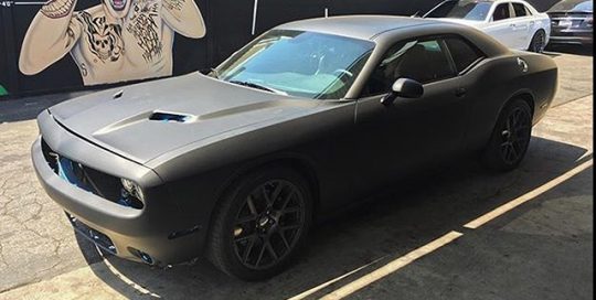 Dodge Challenger wrapped in Matte Deep Black vinyl