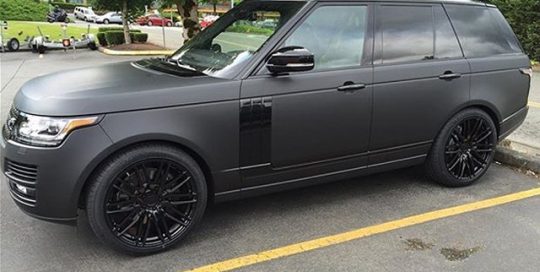 Range Rover wrapped in Matte Deep Black and Gloss Black vinyl