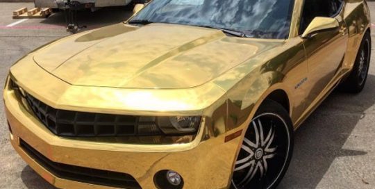 Chevy Camaro wrapped in Avery SW Gold Chrome vinyl