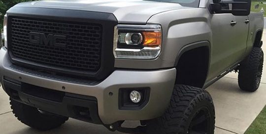 GMC 2500 Trucks wrapped in Matte Silver vinyl
