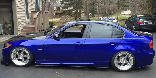 BMW E-90 wrapped in Blue Raspberry vinyl