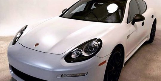 Porsche Panamera wrapped in Avery SW Satin Pearl White vinyl
