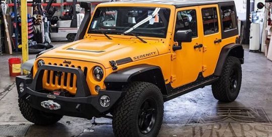 Jeep Wrangler wrapped in Matte Orange vinyl