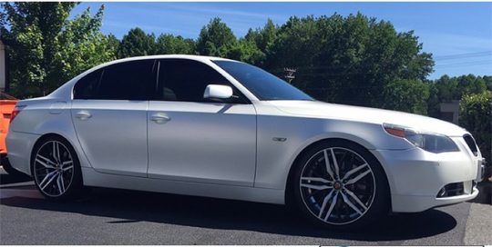 BMW wrapped in Satin Pearl White vinyl