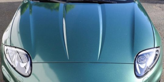 Jaguar RK wrapped in Matte Pine Green Metallic vinyl