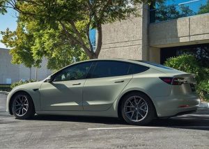 Tesla Model-3 wrapped in Avery SW Satin Khaki Green vinyl