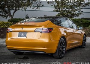 Tesla wrapped in Avery SW900 Gloss Gold Orange Pearlescent vinyl